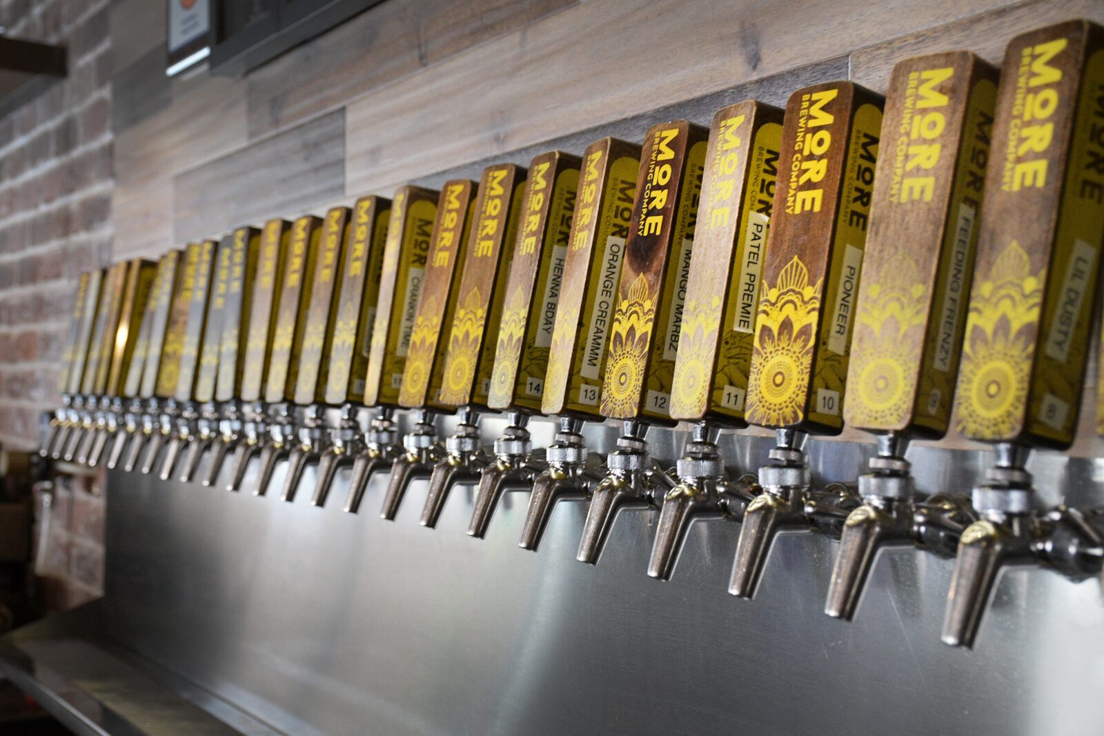 Craft beer taps at a Villa Park brewery